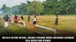 Melalui Gotong Royong, Babinsa Bersama Warga Wujudkan Lapangan Bola Bersih dan Nyaman
