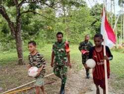 Semangat Kemerdekaan Berkibar di Kampung Sesor, Satgas TMMD Ke-129 Kodim 1807/Sorong Selatan Pasang Bendera Merah Putih