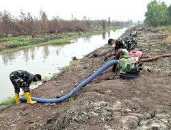 Pastikan Pasokan Air Tetap Siaga, Satgas Pam Irigasi Embung Jokowi Lanud Sjamsudin Noor Rawat Kesiapan Pompa Untuk Penanganan Karhutla
